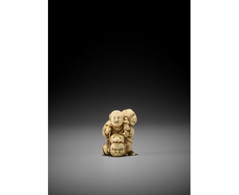 ICHIYUSAI: AN IVORY NETSUKE OF A BOY WITH DOG AND BESHIMI MASK By Ichiyusai Naoharu/Naomitsu, signed Ichiyusai 一遊齋Japan, Edo 