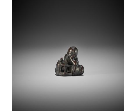 MINKOKU: A WOOD NETSUKE OF A DRUNKEN SHOJO WITH MINOGAME AND SAKE BARREL By Minkoku, signed Minkoku 民谷Japan, Edo (Tokyo), mid