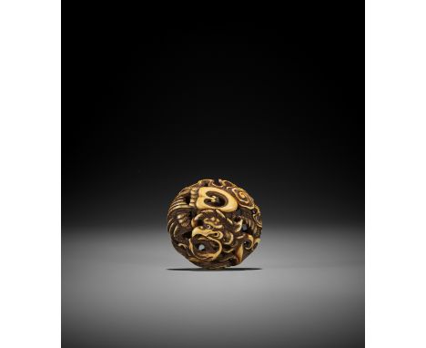 A FINE IVORY RYUSA MANJU NETSUKE WITH HO-O BIRD UnsignedJapan, 19th century, Edo period (1615-1868)Very finely carved and sta