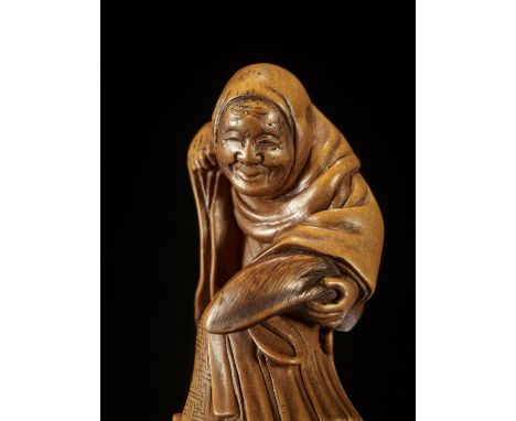 MATSUDA SUKENAGA: A SUPERB WOOD NETSUKE OF A FOX PRIEST IN MID-TRANSFORMATION By Matsuda Sukenaga, signed Sukenaga 亮長Japan, T