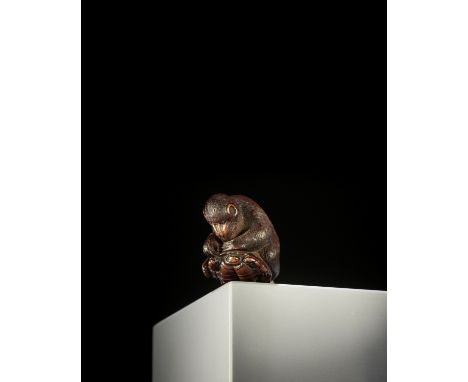 A NAGOYA SCHOOL DARK WOOD NETSUKE OF A MONKEY ON TORTOISE UnsignedJapan, Nagoya, first half of 19th century, Edo period (1615