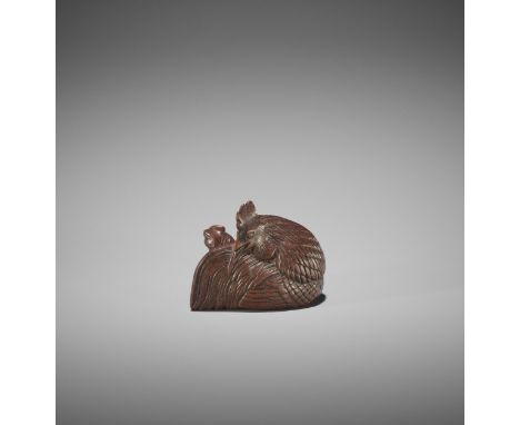 A SUPERB WOOD NETSUKE OF A COCKEREL AND HEN UnsignedJapan, possibly Kyoto, late 18th century, Edo period (1615-1868)The roost