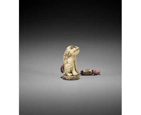 A STAG ANTLER INGYO NETSUKE OF A SHISHI WITH STAG ANTLER OJIME UnsignedJapan, Tokyo, Asakusa, late 19th century, Meiji period