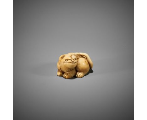 A RARE IVORY ASHTRAY NETSUKE OF A TIGER UnsignedJapan, late 18th to early 19th century, Edo period (1615-1868)The ashtray net