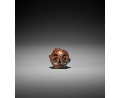 TOMIN: A RARE WOOD NETSUKE OF THE SANSUKUMI ON SKULL By Tomin, signed Tomin 東岷Japan, Tsu, mid-19th century, Edo period (1615-