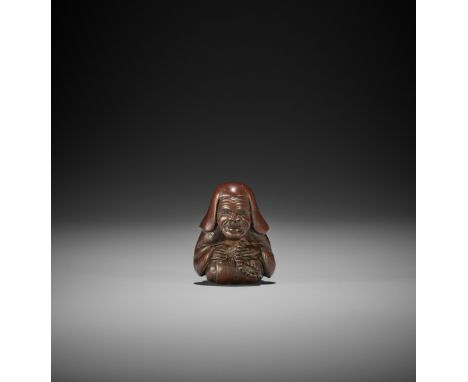 A WOOD SHUNGA NETSUKE OF A PRIEST Signed with a kakihanJapan, 19th century, Edo period (1615-1868)Finely carved as a kneeling