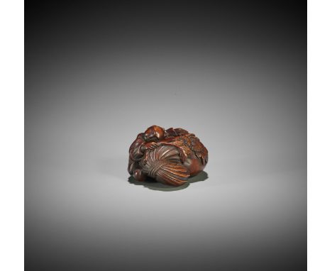 AN EARLY WOOD NETSUKE OF A KARAKO WITH KIKU FLOWER AND TREASURE SACK UnsignedJapan, 18th century, Edo period (1615-1868)The t