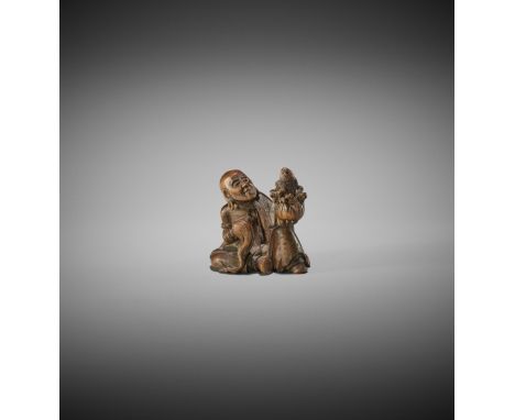 GYOKUMIN: A WOOD NETSUKE OF A RAKAN WITH CARP By Gyokumin, signed Gyokumin 玉民Japan, Edo/Tokyo, second half of 19th centuryDep