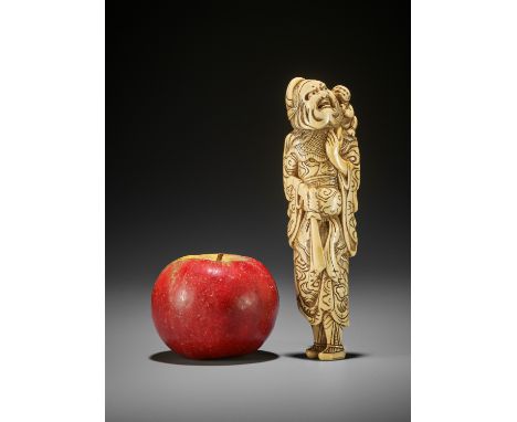 A MONUMENTALLY TALL IVORY NETSUKE OF SHOKI AND ONI UnsignedJapan, 18th century, Edo period (1615-1868)A massive ivory netsuke