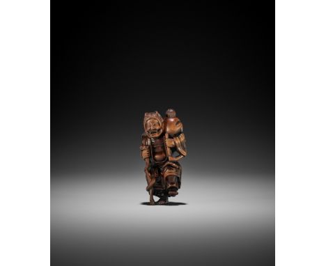 A WOOD NETSUKE OF YAMA-UBA AND KINTARO In the manner of Sanko, unsignedBoldly carved standing on one foot, supporting Kintaro