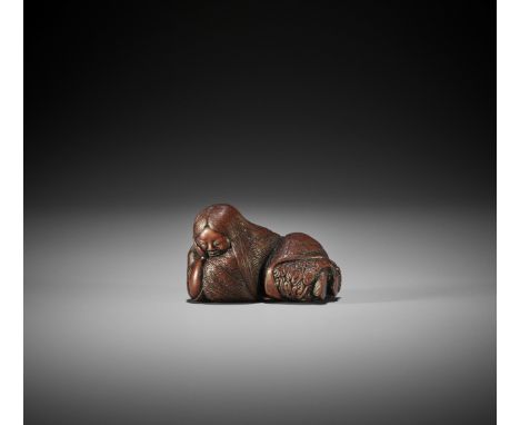 HOJITSU: A FINE NAGOYA SCHOOL NETSUKE OF A SLEEPING SHOJO By Hojitsu, signed Hojitsu 方實Japan, Nagoya, first half of 19th cent