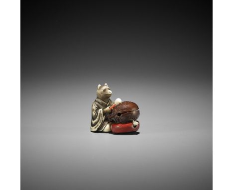 RYUHEI: AN IVORY AND WOOD NETSUKE OF A FOX PRIEST BEATING A MOKUGYO By Asada Ryuheisai, signed Ryuhei 隆平 and kakihanJapan, Ky