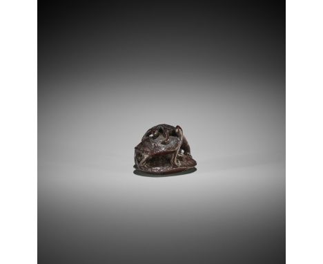 TOMOKAZU: A WOOD NETSUKE OF THREE TURTLES IN A PYRAMID Signed Tomokazu 友一Japan, Gifu, mid-19th century, Edo period (1615-1868