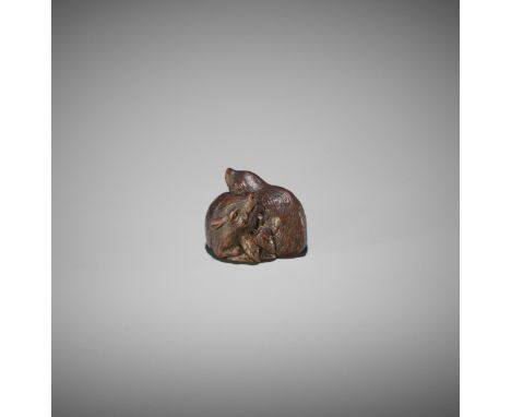 TAMETAKA: A WOOD NETSUKE OF TWO BOARS By Tametaka, signed Tametaka 為隆Japan, Nagoya, late 18th century, Edo period (1615-1868)
