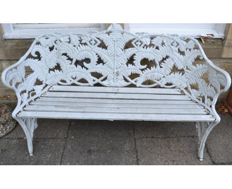 A Coalbrookdale style white painted cast metal fern pattern garden bench 