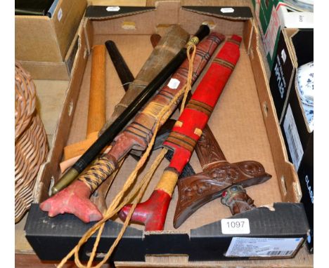 Three various Kris; three various Filipino swords, and one other item (7)