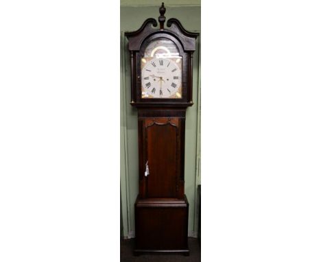 An oak and mahogany thirty hour longcase clock, signed Thos Russell, Lancaster, circa 1830, swan neck pediment, double acorn 