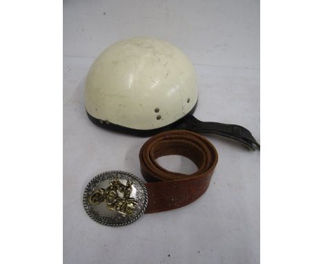 A vintage Motorcycle helmet (display only) and a related belt