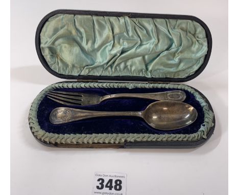 Cased set of silver Walker &amp; Hall spoon and fork, total w: 2.5 ozt