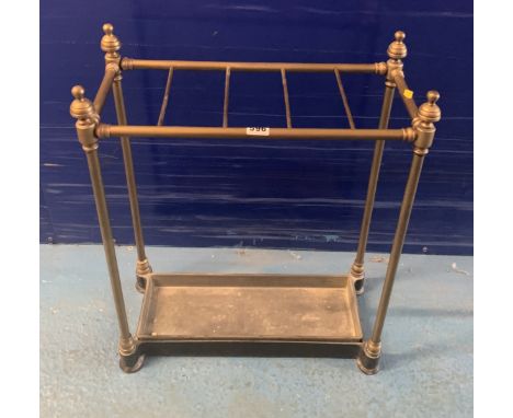 Brass stick stand, 19”w x 8.5”d x 22”h