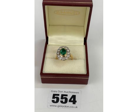 18K Gold Ring With Centre Emerald Surrounded By Diamonds, Size J, W: 7.2 Gms. Emerald 1.5 Ct, Diamonds Approx. 64 Points. Col