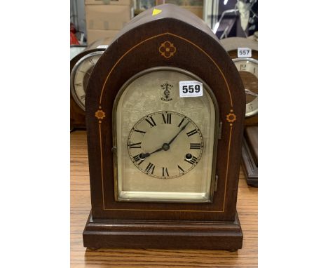 Arch shaped wooden inlaid 2-hole mantle clock, 10” w x 14”h