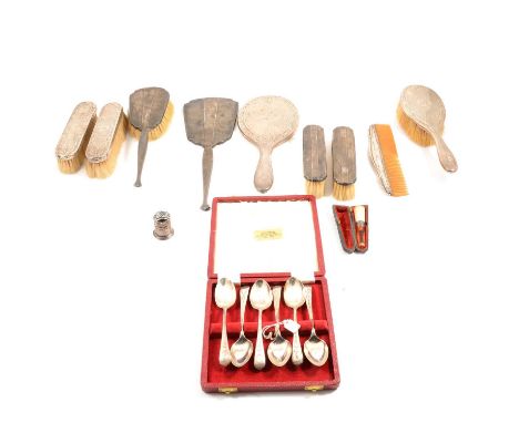 Silver dressing table items; including four silver covered hand mirrors; three silver covered brushes; comb with silver edge;