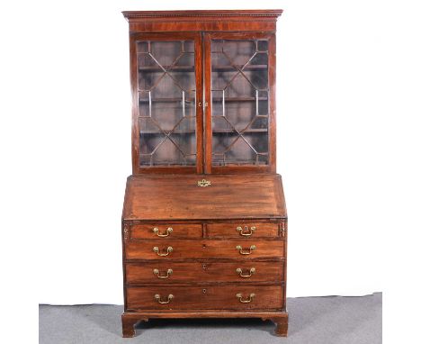 George III mahogany bureau bookcase, moulded and dentil cornice, plain frieze, the upper section with astragal glazed doors e