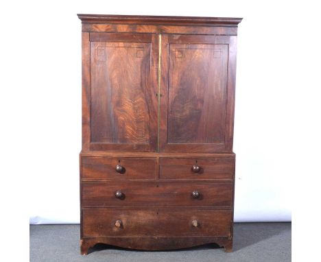 George III mahogany linen press, cavetto cornice above two doors enclosing a hanging rail and two hardwood shelves, two short