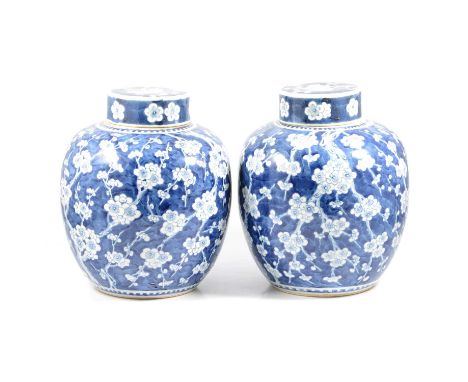 Pair of large Chinese porcelain ginger jar and covers, prunus blossom design in blue and white, 29cm high.Qty: 2Condition rep