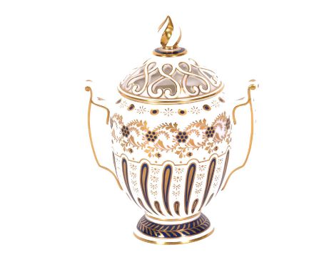 A Royal Worcester 'Heritage Collection' twin-handled pot pourri vase and cover, 2010, in cobalt blue with gilt detailing, 17c