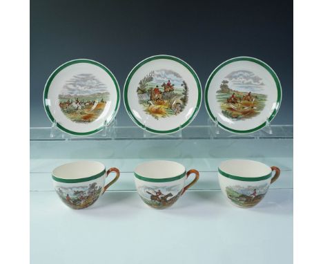 A charming set of three demitasse cups and saucers by Copeland Spode, England, each beautifully decorated with traditional En