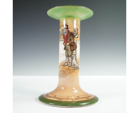 A candlestick holder featuring the character Bill Sykes from Charles Dickens' Oliver Twist. This early piece depicts the vill
