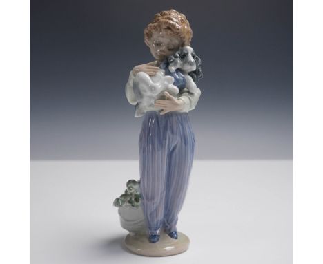 This Lladro Collectors Society exclusive figurine, titled My Buddy, features a young girl tenderly holding a puppy. Sculpted 