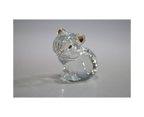 Baccarat crystal tiger figurine featuring exquisite craftsmanship with gold-accented details. Marked with the Baccarat France