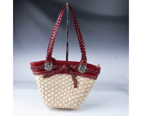 A coordinated collection of four Brighton pieces in rich red leather and woven materials, showcasing the brand's signature bl