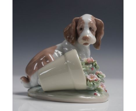 Charming Lladro figurine titled It Wasn't Me, item number 1007672, depicting an innocent-looking puppy beside a toppled flowe