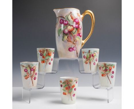 Charming hand-painted porcelain set featuring a tall pitcher marked Vignaud Limoges and five coordinating cups marked Limoges