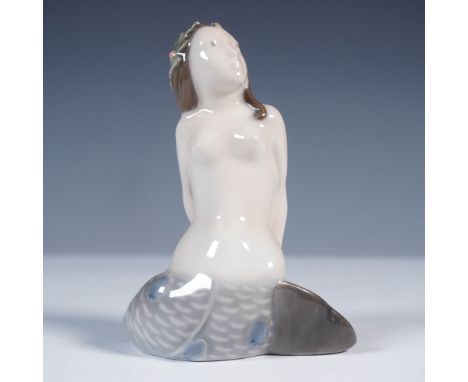 Royal Copenhagen porcelain figurine titled Mermaid, model number 3321. This graceful piece features a serene mermaid figure w