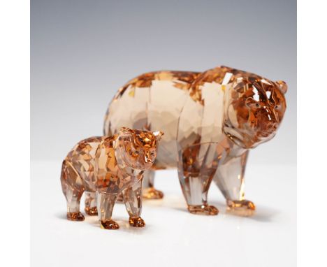 This crystal figurine set captures the intimate connection between a bear and her cub in striking sunray colored crystal. The