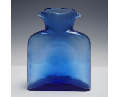 Striking hand-blown art glass pitcher in vibrant cobalt blue, featuring a squared body with rounded shoulders and a wide, exp
