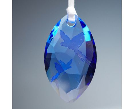 Swarovski Crystal Society (SCS) 2014 Event ornament featuring hyacinth macaws, issued as a gift with purchase during select S