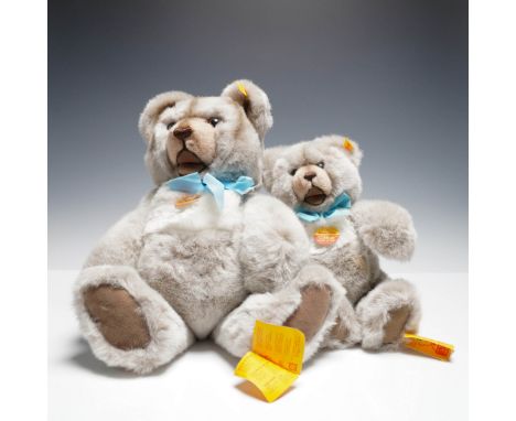 Pair of plush Steiff teddy bears from the Minky Zotty line, each with the classic Steiff yellow ear tag and chest medallion. 