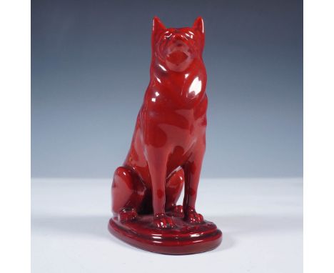 This striking porcelain figurine by Zsolnay Hungary depicts a seated German Shepherd in a vivid flamb© glaze, a technique for