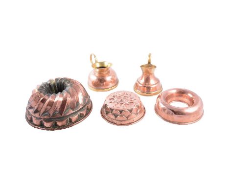 Copper and brass kitchenalia including jelly moulds, jugs, pans, etc