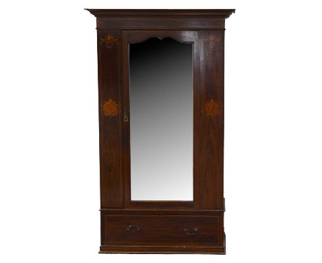 Edwardian inlaid walnut wardrobe, moulded cornice, mirrored door enclosing a hanging rail and hooks, drawer below, plinth bas