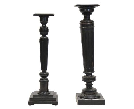 Ebonised torchere, the top 26.5x25cm, turned and fluted column, square base, height 112cm, and another similar, smaller, the 