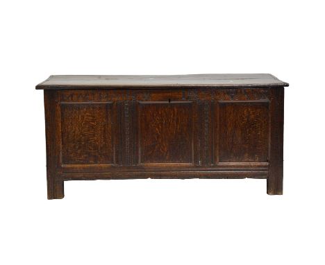 Joined oak coffer, 18th Century, hinged boarded lid, three panel front carved "Mary Mathew 1709", width 132cm, depth 52cm, he