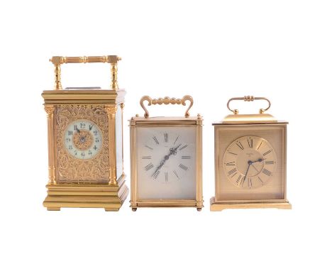 French brass carriage clock, striking movement, blind fret dial, 16cm; two later carriage clocks (with with battery movement)