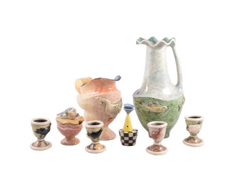 Small collection of Anna Lambert ceramics, including a ewer with applied fish, 31cm, jug with goose, mustard pot, model and f